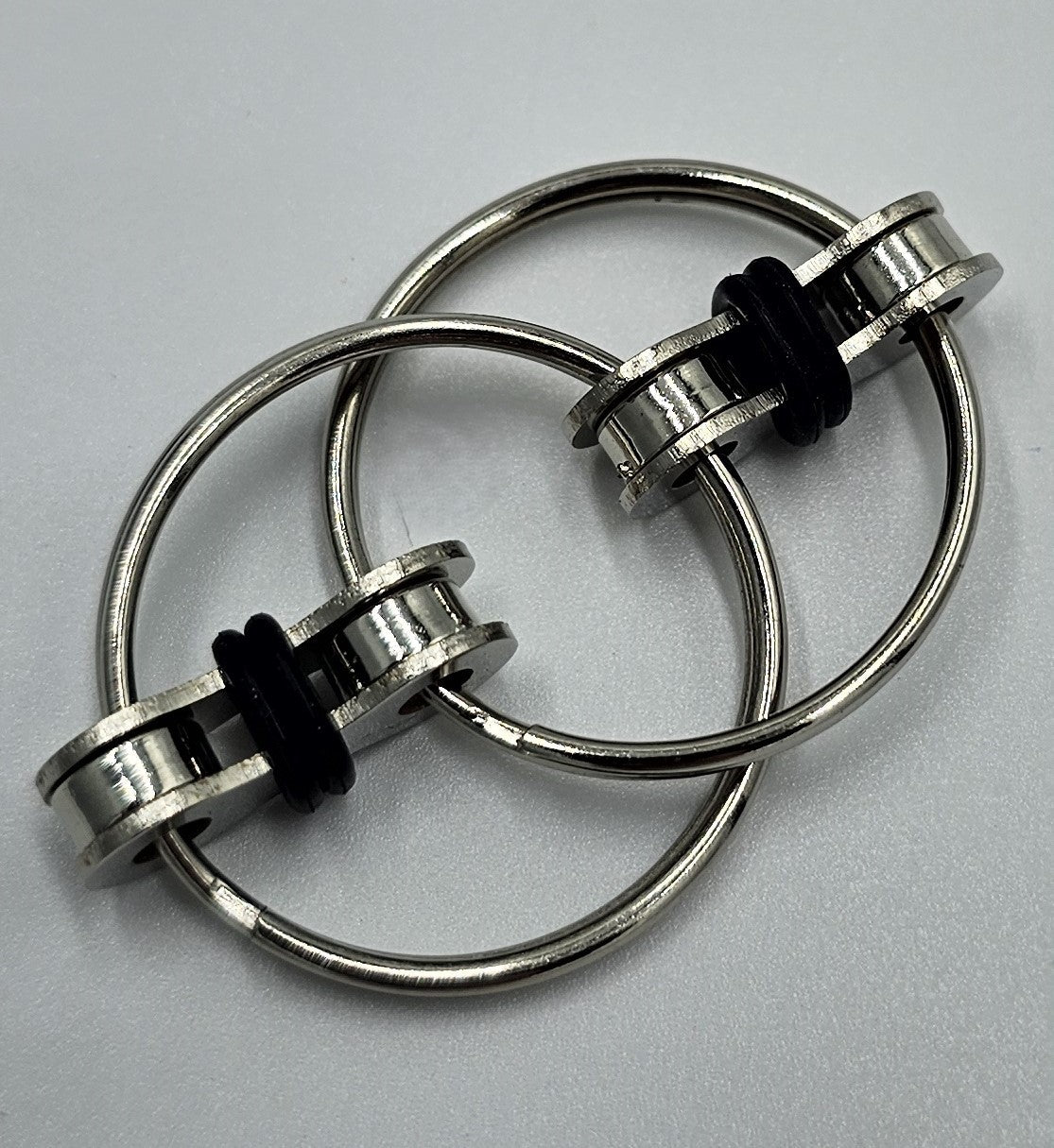 Polkupyöräketju fidget sormus